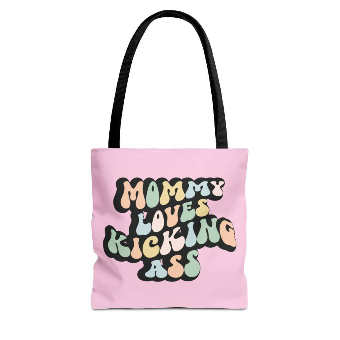 Perfect gift for mom. A Pink tote bag, available in three sizes. In a typically 70s retro-style font, it says Mommy Loves Kicking Ass. The handle is black.