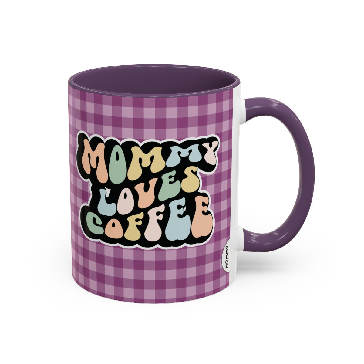 Perfect gift for mom. A decorative, 11oz ceramic mug. It’s wrapped in a purple-white checkered background. In a happy and colorful 70s retro-style font it says Mommy Loves Coffee, on both sides.