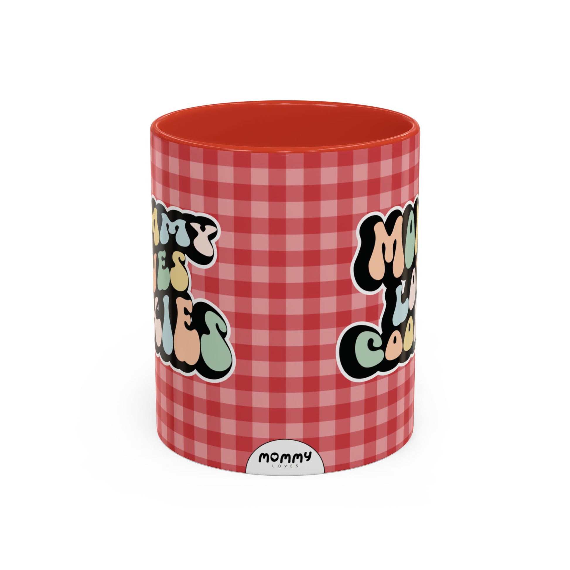 Perfect gift for mom. A decorative, 11oz ceramic mug. It’s wrapped in a red-white checkered background. In a happy and colorful 70s retro-style font it says Mommy Loves Cookies, on both sides.