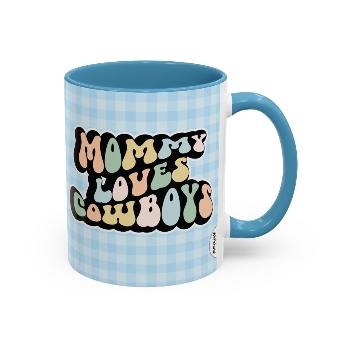 Perfect gift for mom. A decorative, 11oz ceramic mug. It’s wrapped in a light blue-white checkered background. In a happy and colorful 70s retro-style font it says Mommy Loves Cowboys, on both sides.