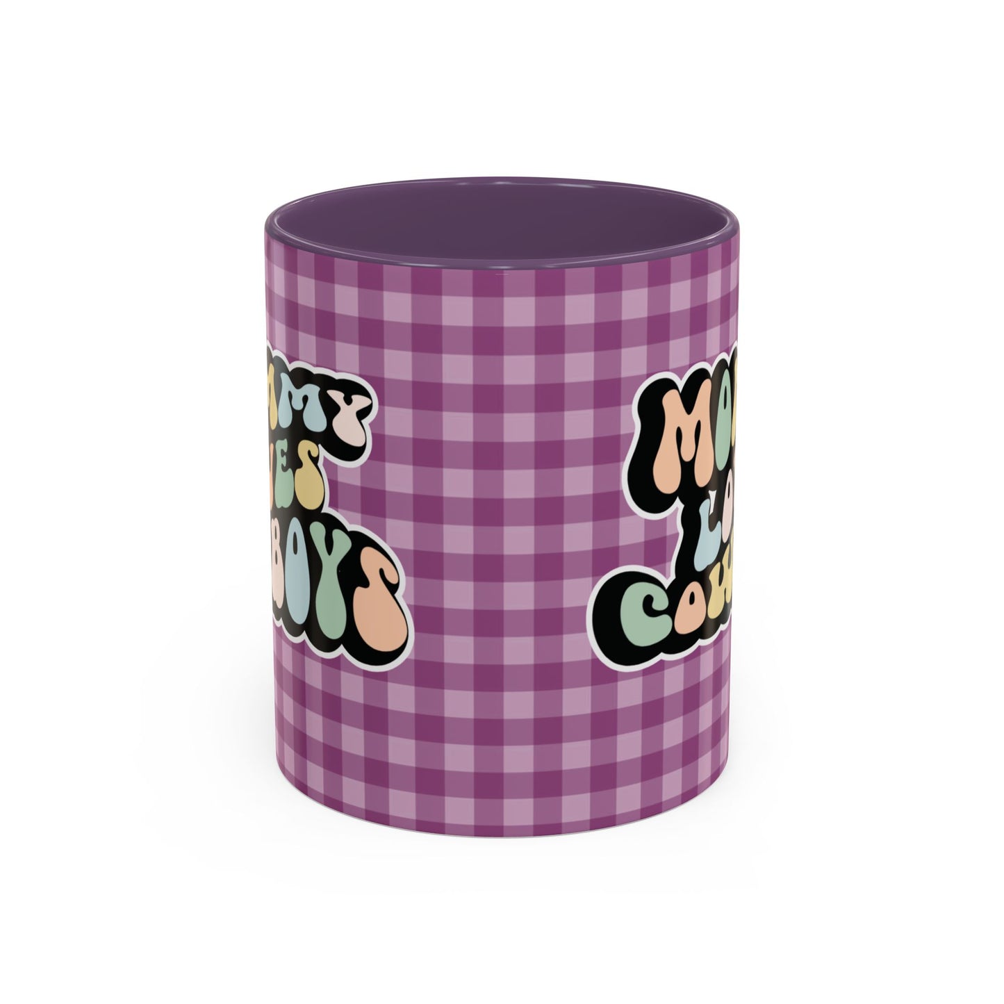Perfect gift for mom. A decorative, 11oz ceramic mug. It’s wrapped in a purple-white checkered background. In a happy and colorful 70s retro-style font it says Mommy Loves Cowboys, on both sides.