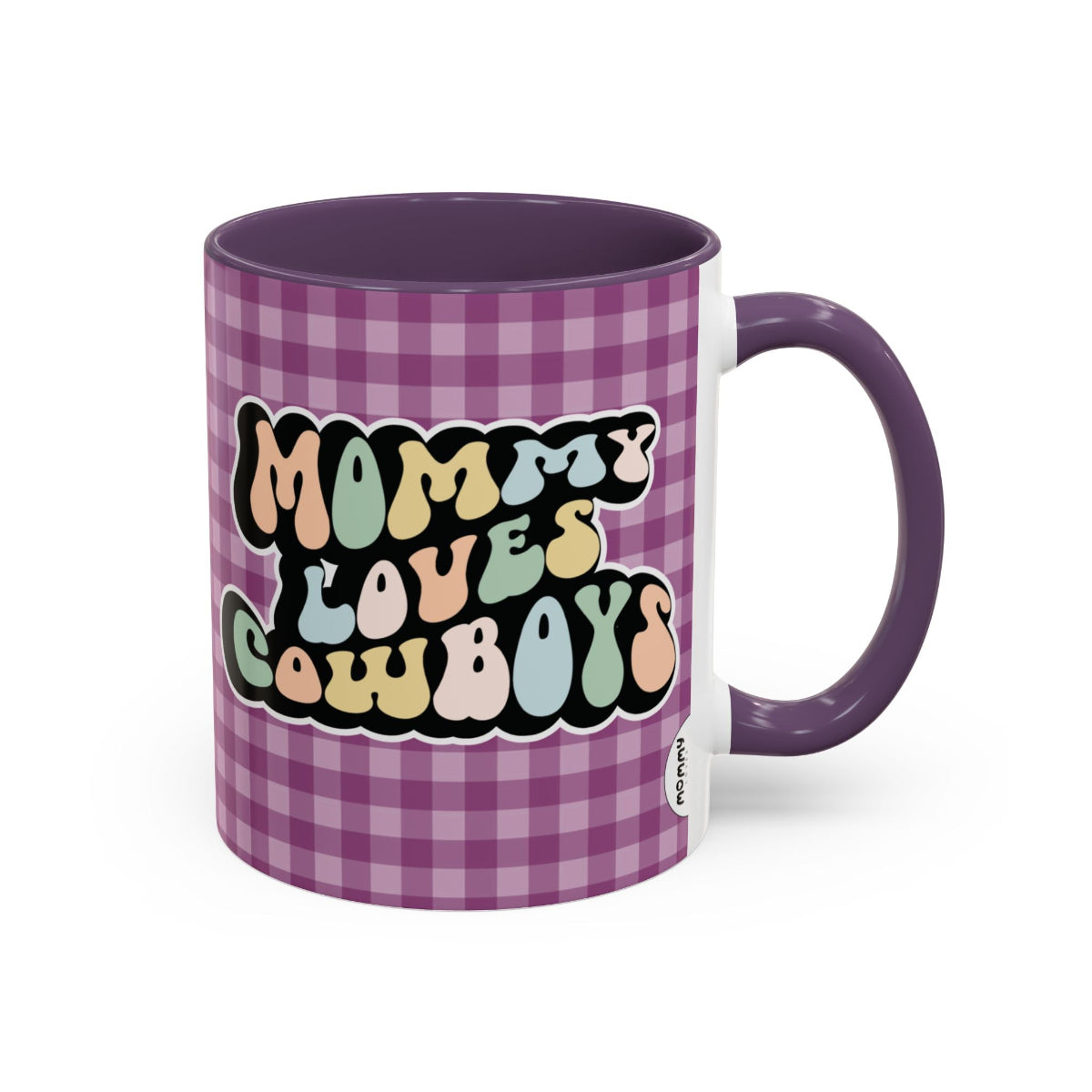 Perfect gift for mom. A decorative, 11oz ceramic mug. It’s wrapped in a purple-white checkered background. In a happy and colorful 70s retro-style font it says Mommy Loves Cowboys, on both sides.
