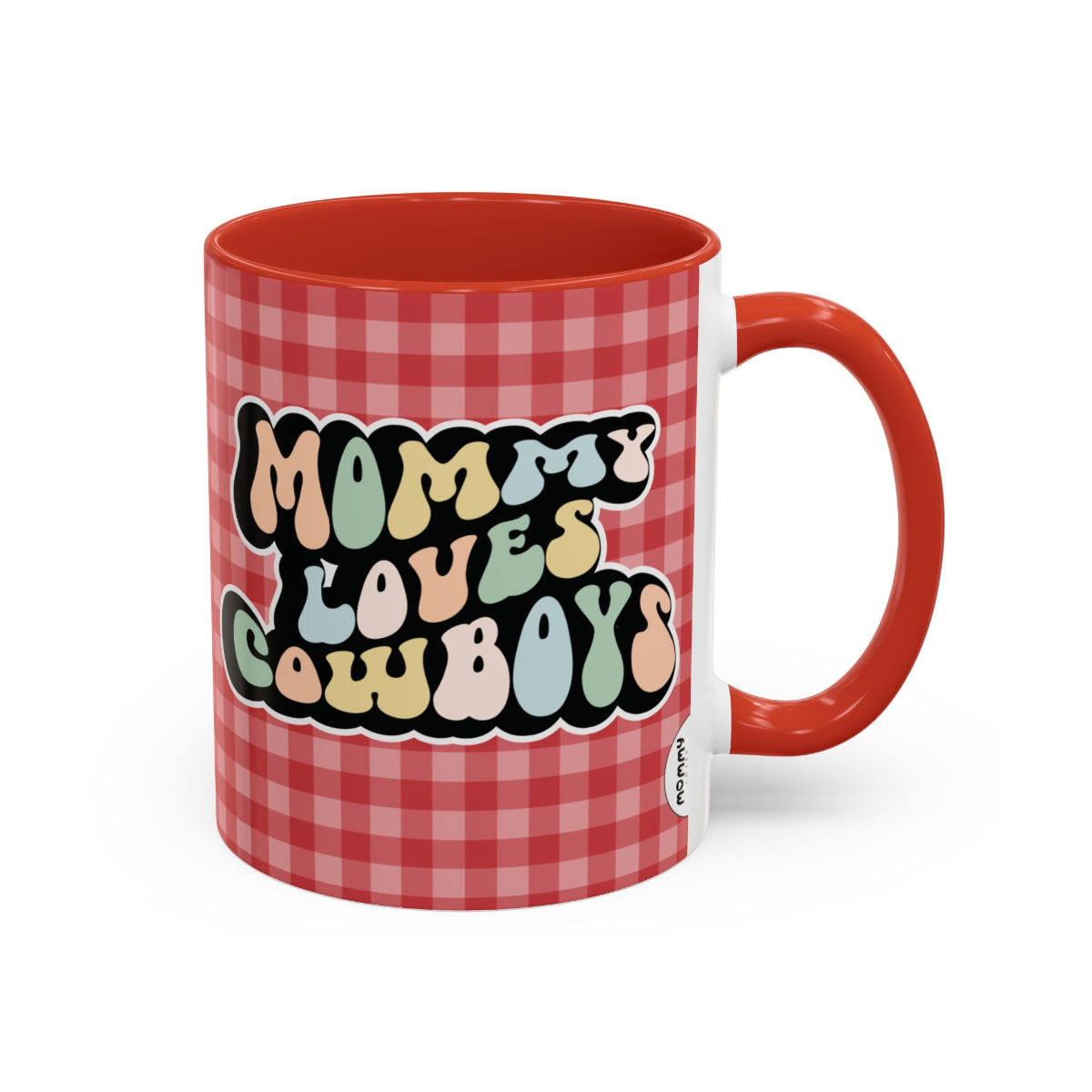Perfect gift for mom. A decorative, 11oz ceramic mug. It’s wrapped in a red-white checkered background. In a happy and colorful 70s retro-style font it says Mommy Loves Cowboys, on both sides.