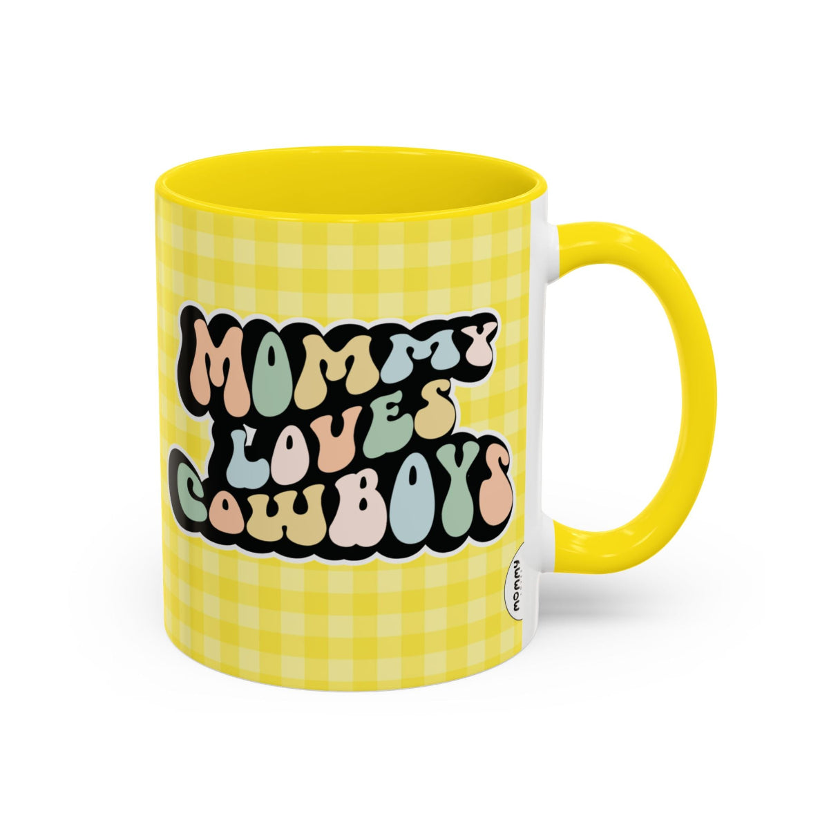 Perfect gift for mom. A decorative, 11oz ceramic mug. It’s wrapped in a yellow-white checkered background. In a happy and colorful 70s retro-style font it says Mommy Loves Cowboys, on both sides.