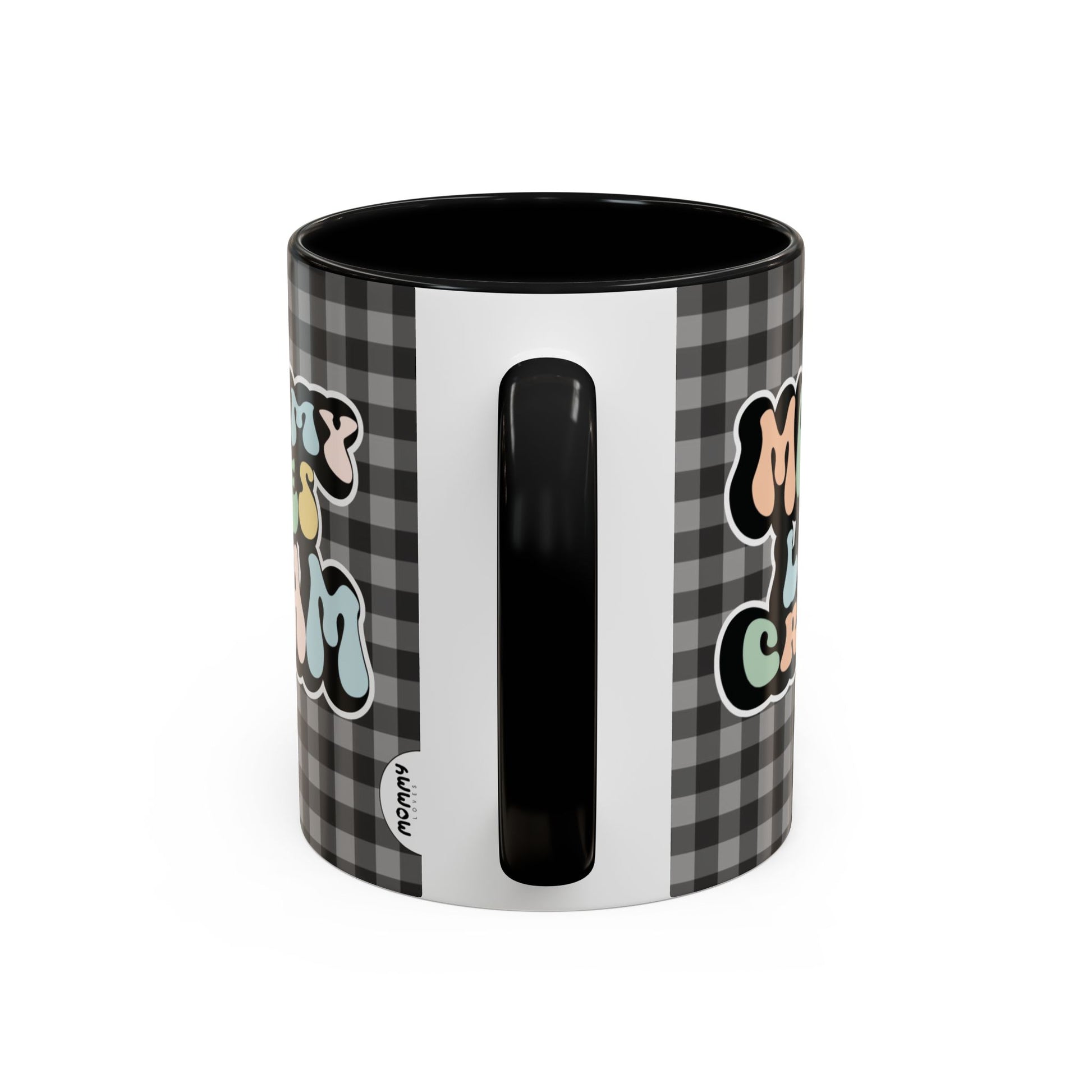 Perfect gift for mom. A decorative, 11oz ceramic mug. It’s wrapped in a black-white checkered background. In a happy and colorful 70s retro-style font it says Mommy Loves Cream, on both sides.