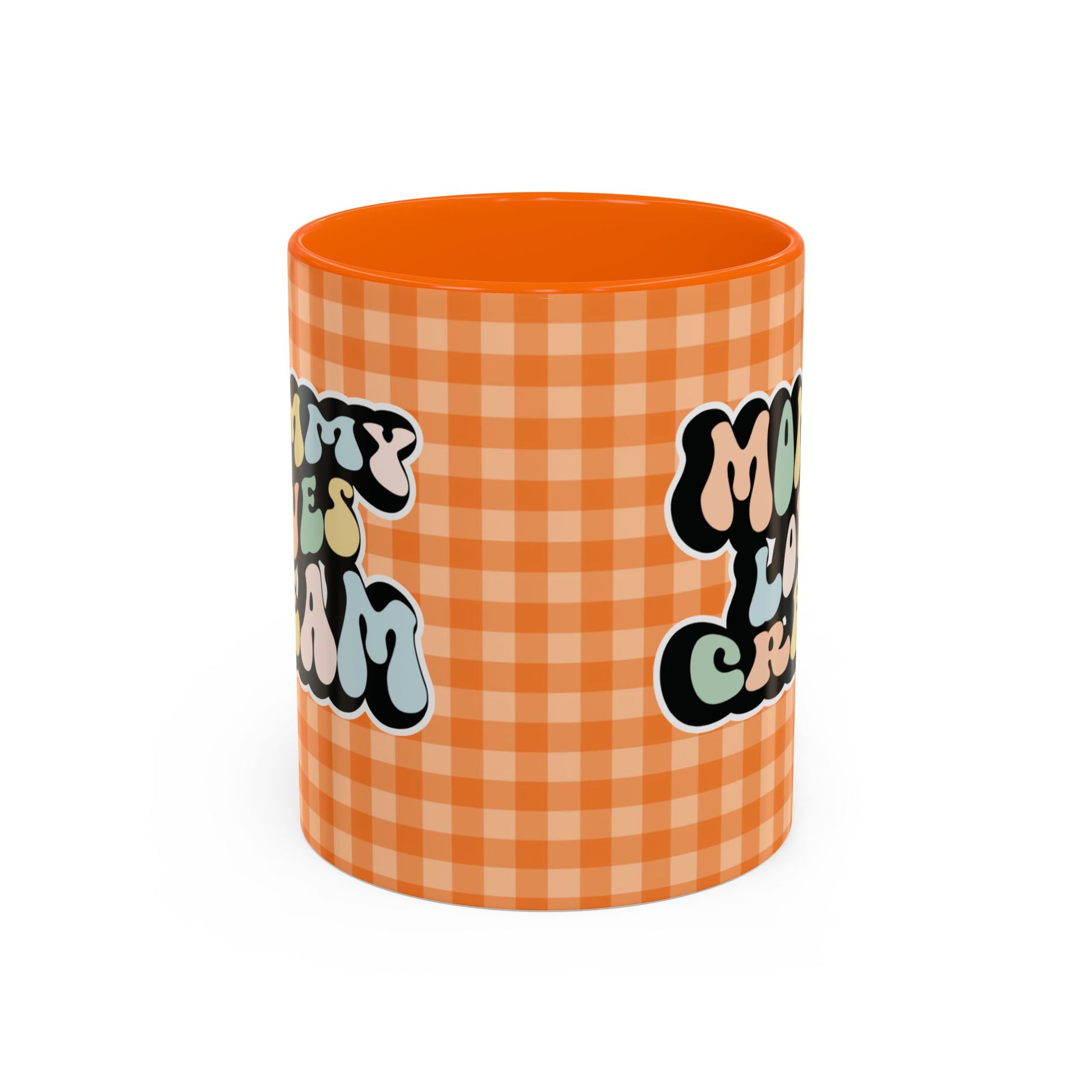Perfect gift for mom. A decorative, 11oz ceramic mug. It’s wrapped in a orange-white checkered background. In a happy and colorful 70s retro-style font it says Mommy Loves Cream, on both sides.