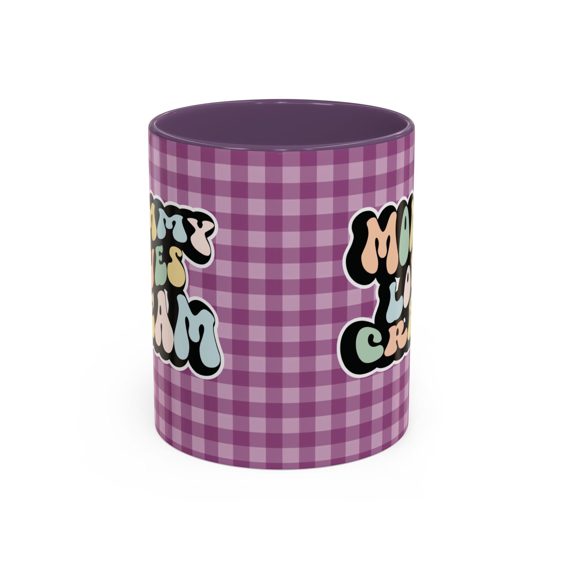 Perfect gift for mom. A decorative, 11oz ceramic mug. It’s wrapped in a purple-white checkered background. In a happy and colorful 70s retro-style font it says Mommy Loves Cream, on both sides.