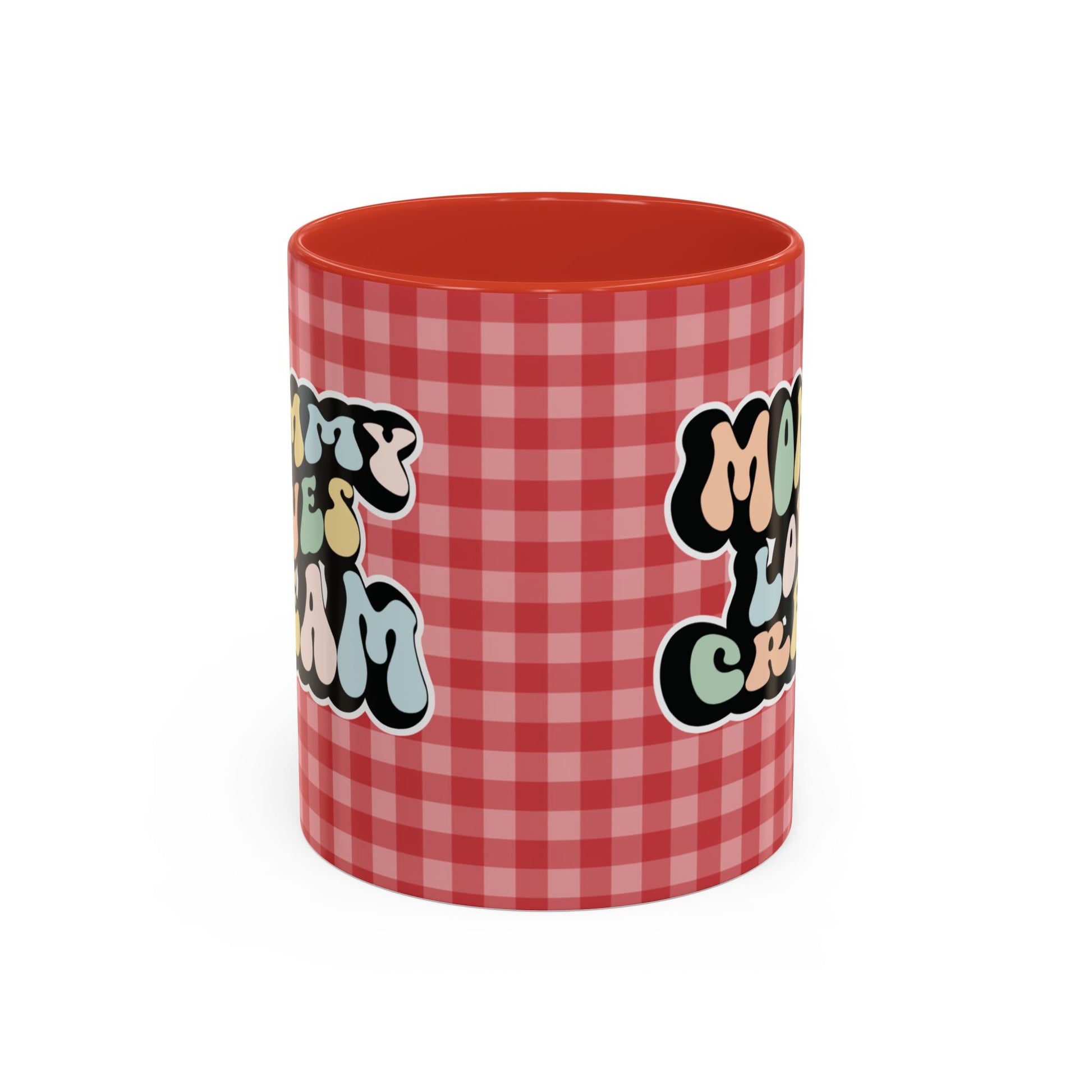 Perfect gift for mom. A decorative, 11oz ceramic mug. It’s wrapped in a red-white checkered background. In a happy and colorful 70s retro-style font it says Mommy Loves Cream, on both sides.