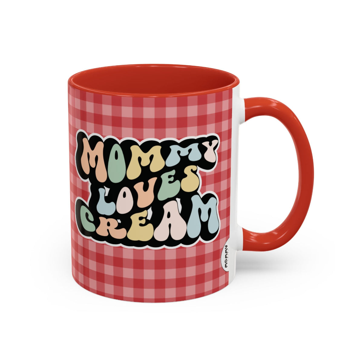 Perfect gift for mom. A decorative, 11oz ceramic mug. It’s wrapped in a red-white checkered background. In a happy and colorful 70s retro-style font it says Mommy Loves Cream, on both sides.
