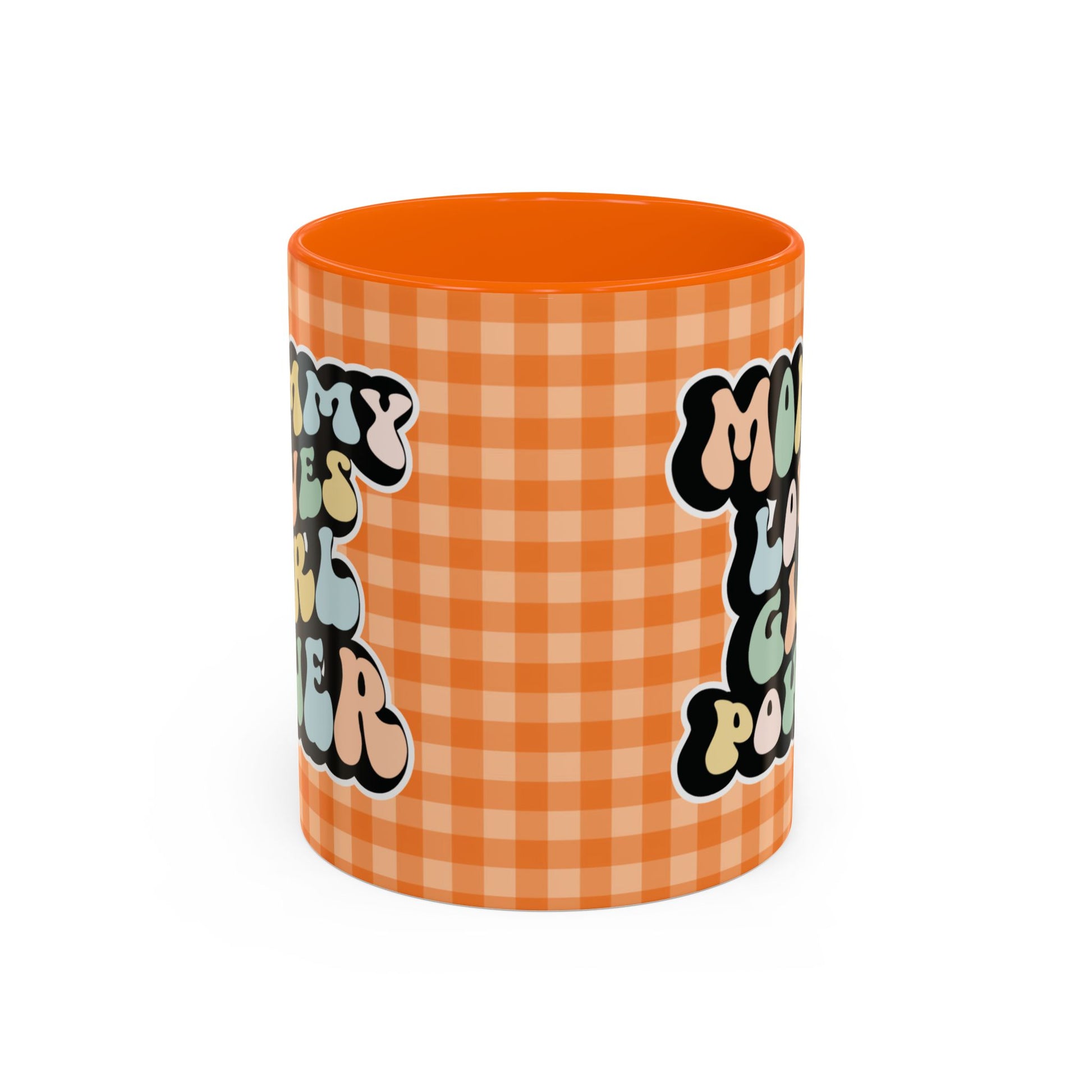 Perfect gift for mom. A decorative, 11oz ceramic mug. It’s wrapped in a orange-white checkered background. In a happy and colorful 70s retro-style font it says Mommy Loves Girl Power, on both sides.