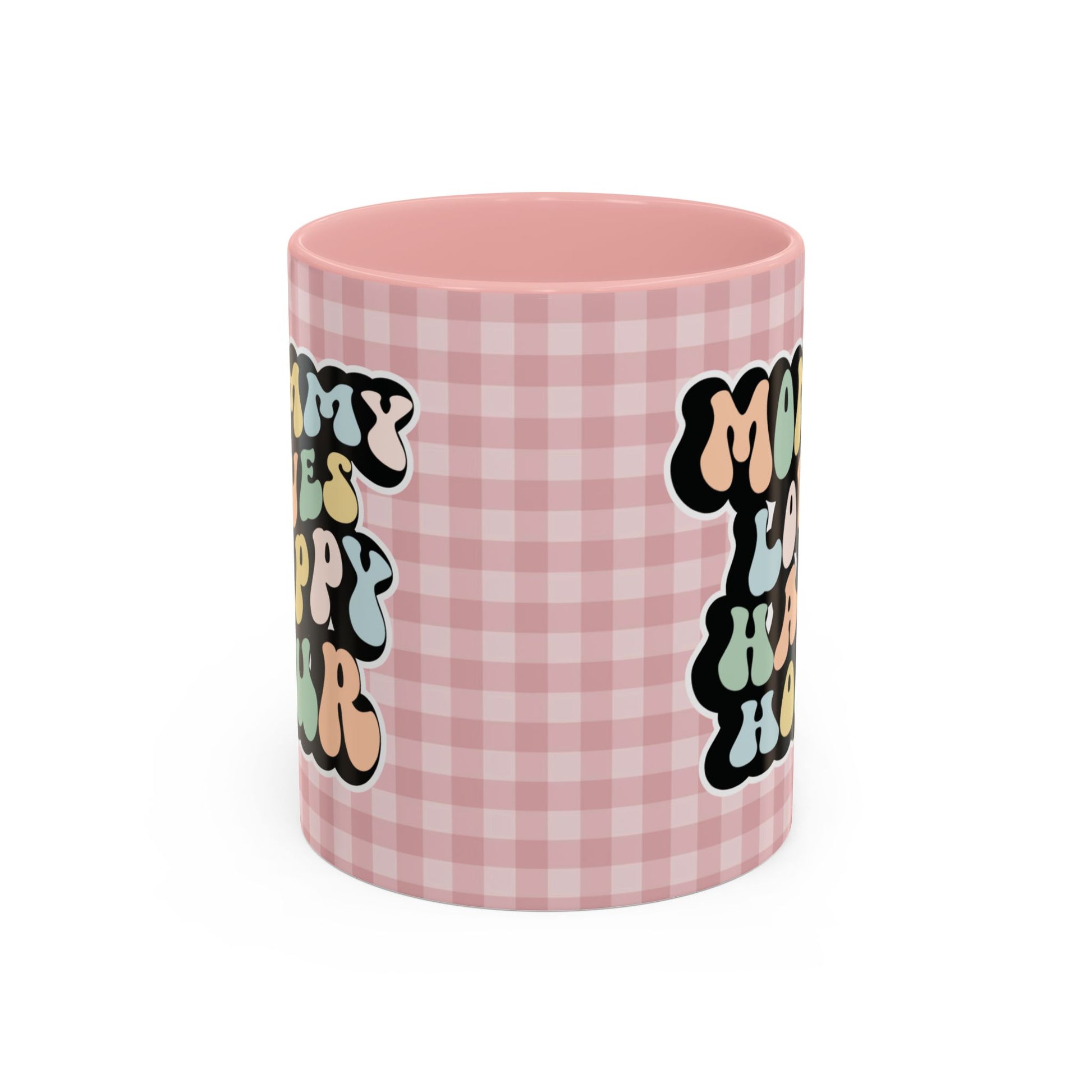 Perfect gift for mom. A decorative, 11oz ceramic mug. It’s wrapped in a soft pink-white checkered background. In a happy and colorful 70s retro-style font it says Mommy Loves Happy Hour, on both sides.