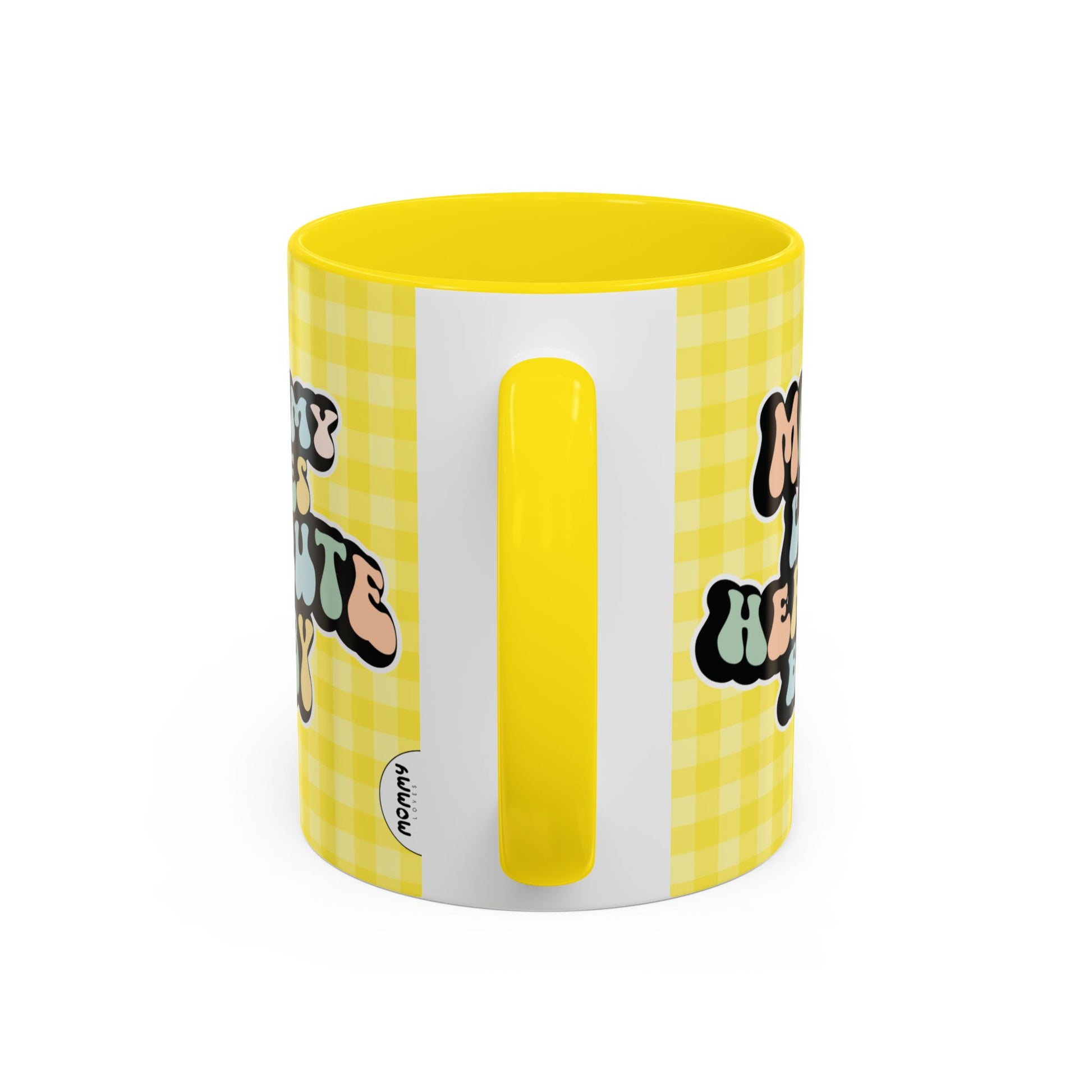 Perfect gift for mom. A decorative, 11oz ceramic mug. It’s wrapped in a yellow-white checkered background. In a happy and colorful 70s retro-style font it says Mommy Loves Her Cute Baby, on both sides.