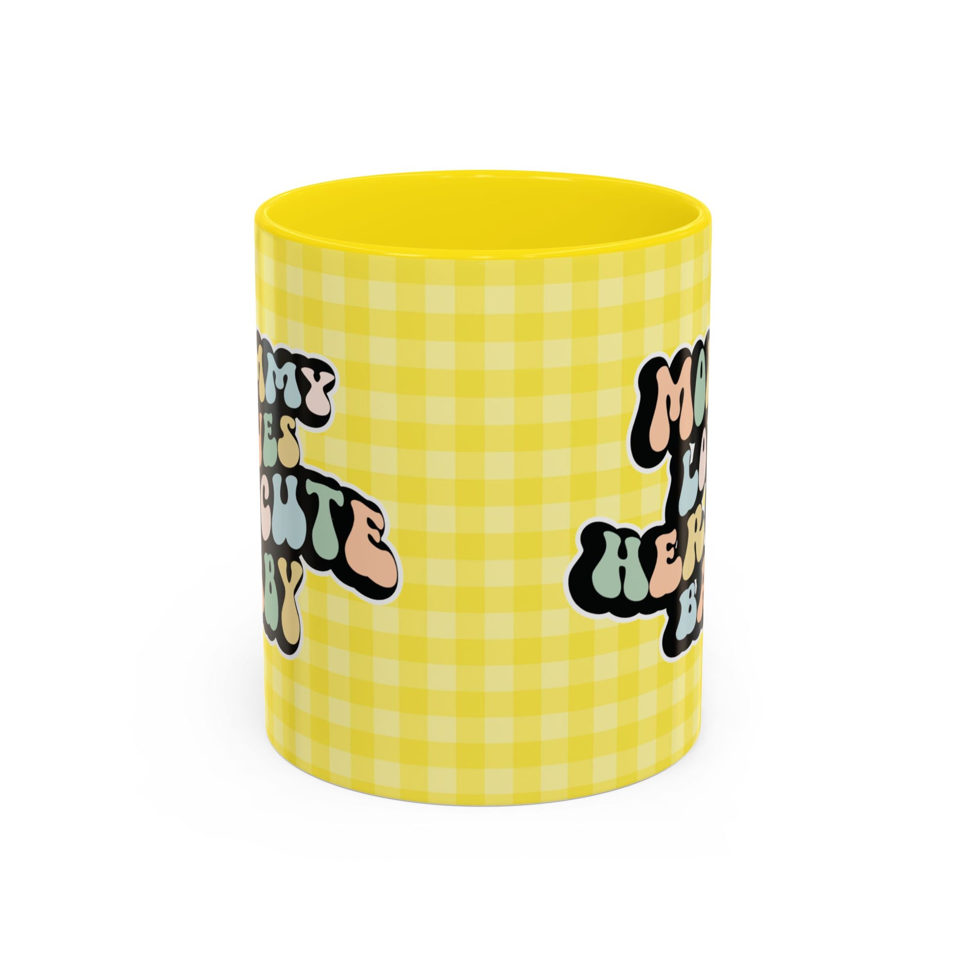 Perfect gift for mom. A decorative, 11oz ceramic mug. It’s wrapped in a yellow-white checkered background. In a happy and colorful 70s retro-style font it says Mommy Loves Her Cute Baby, on both sides.