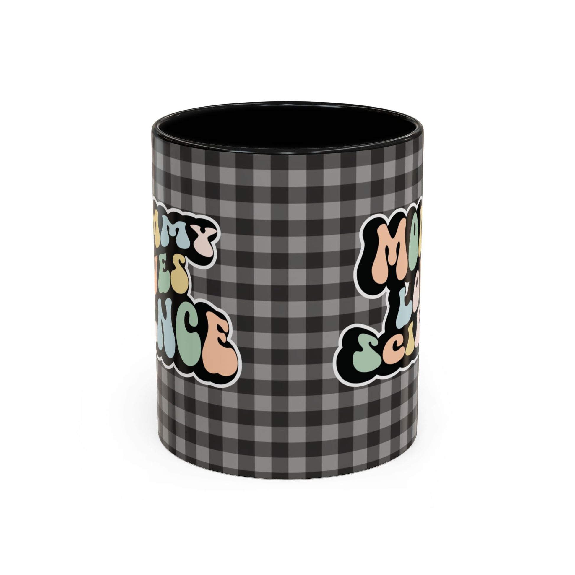 Perfect gift for mom. A decorative, 11oz ceramic mug. It’s wrapped in a black-white checkered background. In a happy and colorful 70s retro-style font it says Mommy Loves Science, on both sides.