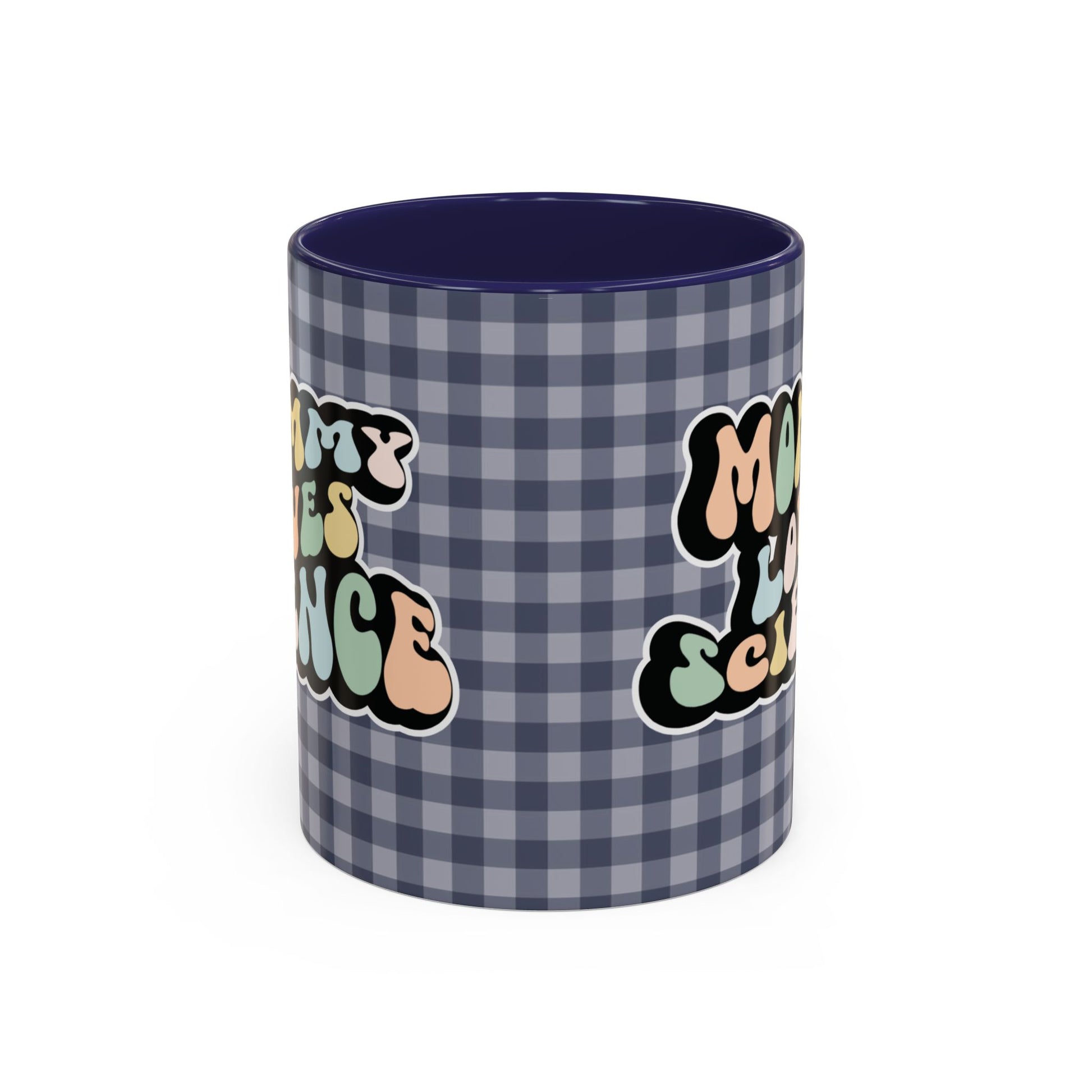 Perfect gift for mom. A decorative, 11oz ceramic mug. It’s wrapped in a navy blue-white checkered background. In a happy and colorful 70s retro-style font it says Mommy Loves Science, on both sides.