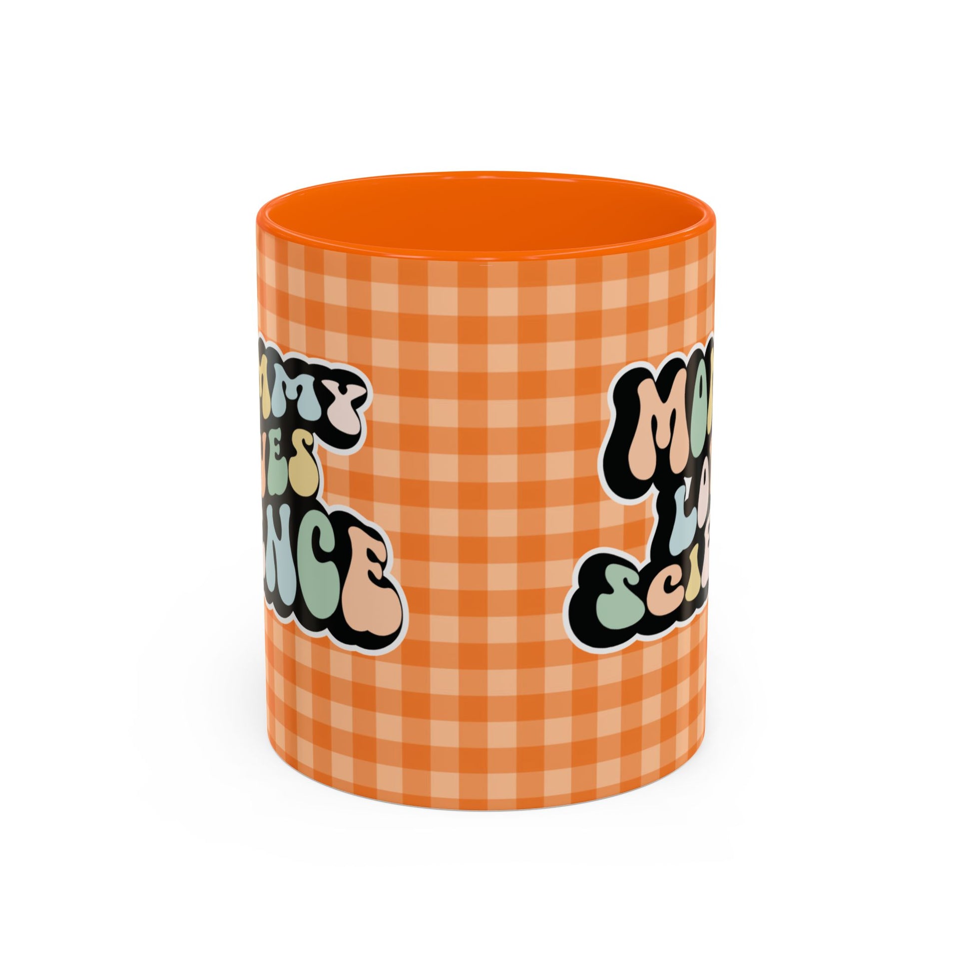 Perfect gift for mom. A decorative, 11oz ceramic mug. It’s wrapped in a orange-white checkered background. In a happy and colorful 70s retro-style font it says Mommy Loves Science, on both sides.