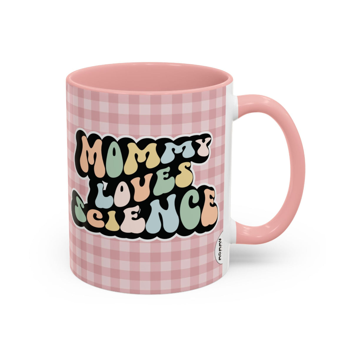 Perfect gift for mom. A decorative, 11oz ceramic mug. It’s wrapped in a soft pink-white checkered background. In a happy and colorful 70s retro-style font it says Mommy Loves Science, on both sides.
