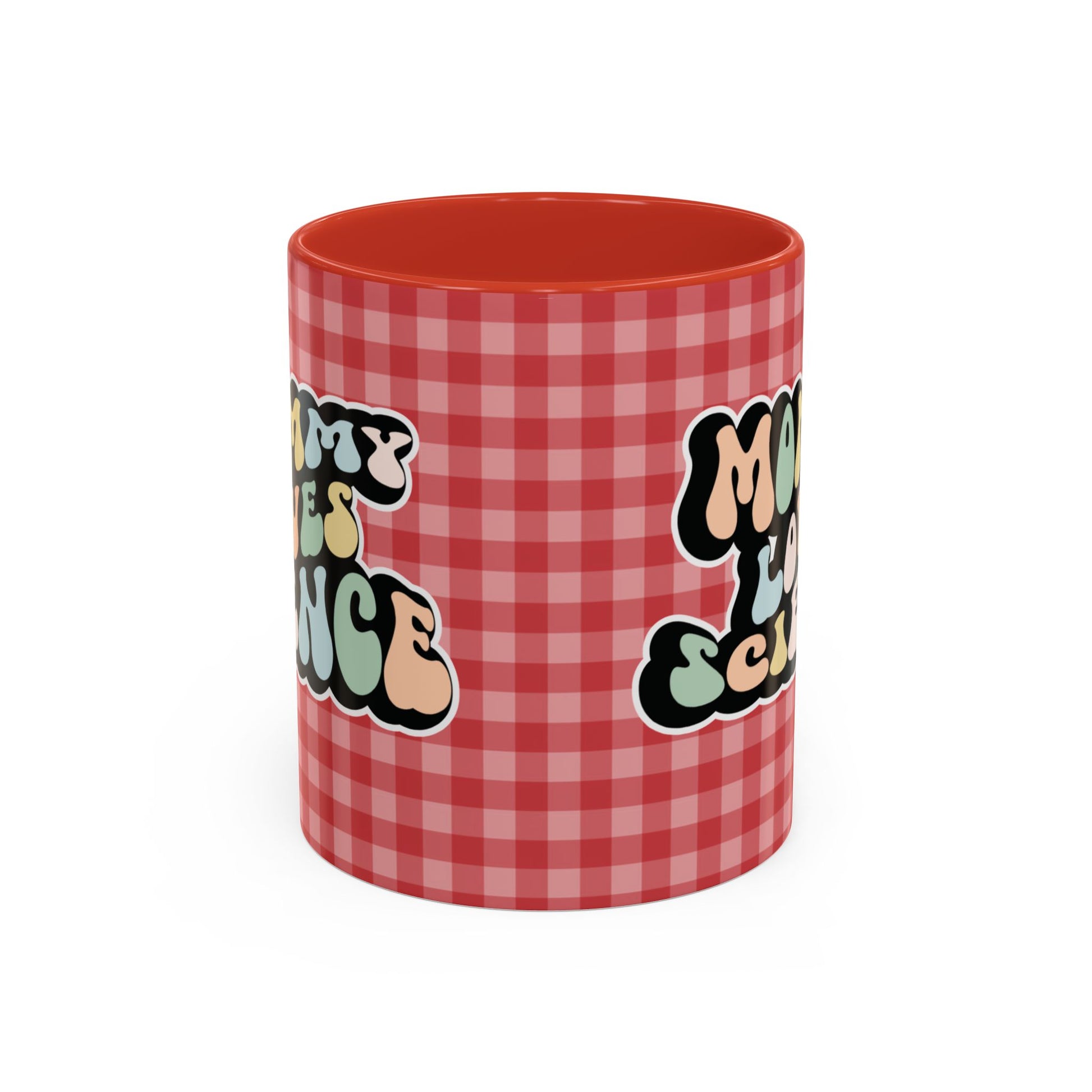 Perfect gift for mom. A decorative, 11oz ceramic mug. It’s wrapped in a red-white checkered background. In a happy and colorful 70s retro-style font it says Mommy Loves Science, on both sides.