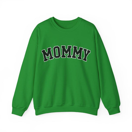 The perfect gift for mom. Our Mother’s Day special. Our crewneck sweatshirt. The color of the shirt is irish green, and in big, black, varsity letters it says MOMMY on the chest. It’s available in six sizes, ranging from S to 3XL.