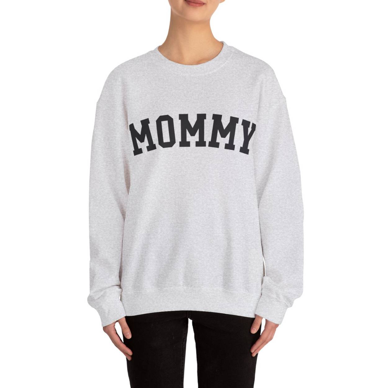 The perfect gift for mom. Our Mother’s Day special. Our crewneck sweatshirt. The color of the shirt is ash, and in big black varsity letters it says MOMMY on the chest. It’s available in six sizes, ranging from S to 3XL.