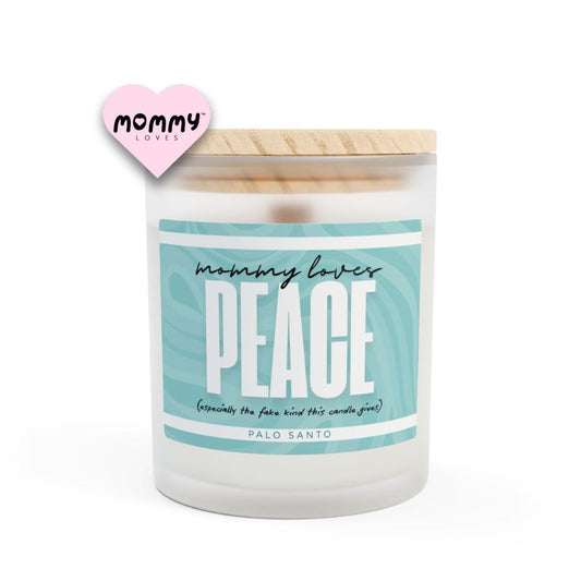 The perfect gift for mom, especially for mother's day. A frosted glass scented candle, with a wooden lid. The glass vessel is 11 oz, and the wax is 9oz. Burning time is around 50 hours. The label is beautifully designed in light blue colors, and it says: Mommy Loves Peace. Underneath, in between brackets it says: especially the fake kind this candle gives. A funny, yet original gift for mom! The fragrance is palo santo. Super relaxing.