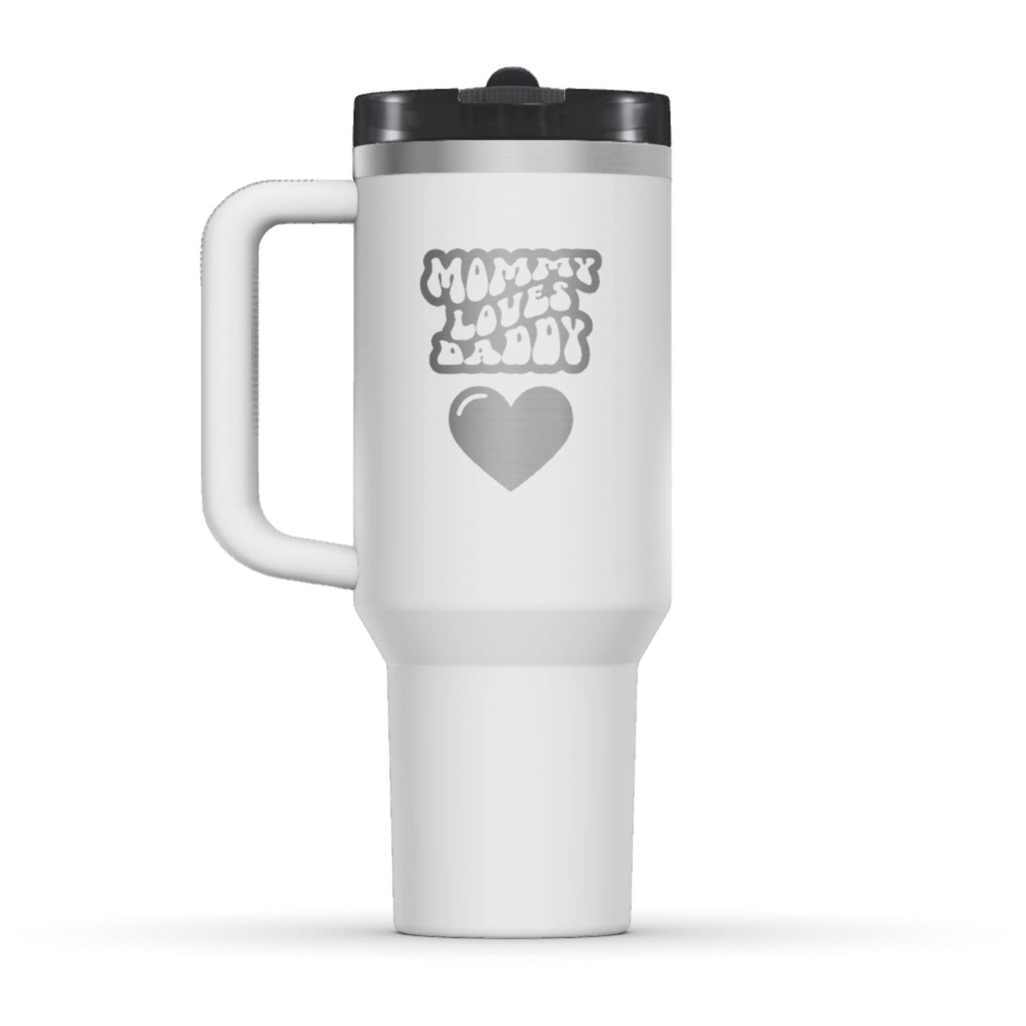 The back side of the newest Stanley 40oz Tumbler. The perfect gift for mom. The Color of the cup is Chalk, a fresh shade of white. It’s engraved with a typically 70s retro-style font, saying Mommy Loves Daddy. Under that text there is a nice big heart in the same retro style.