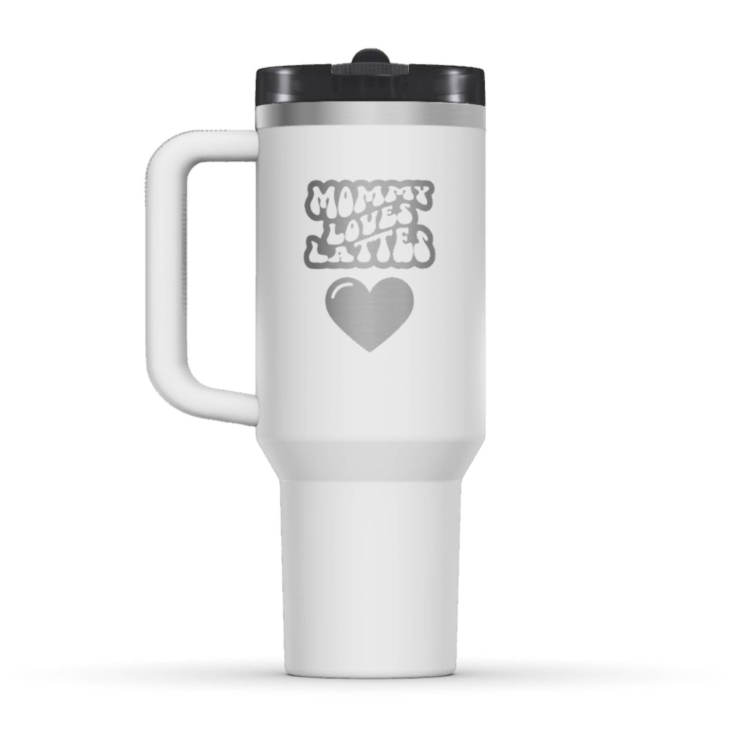 The back side of the newest Stanley 40oz Tumbler. The perfect gift for mom. The Color of the cup is Chalk, a shade of fresh white. It’s engraved with a typically 70s retro-style font, saying Mommy Loves Lattes. Under that text there is a nice big heart in the same retro style.
