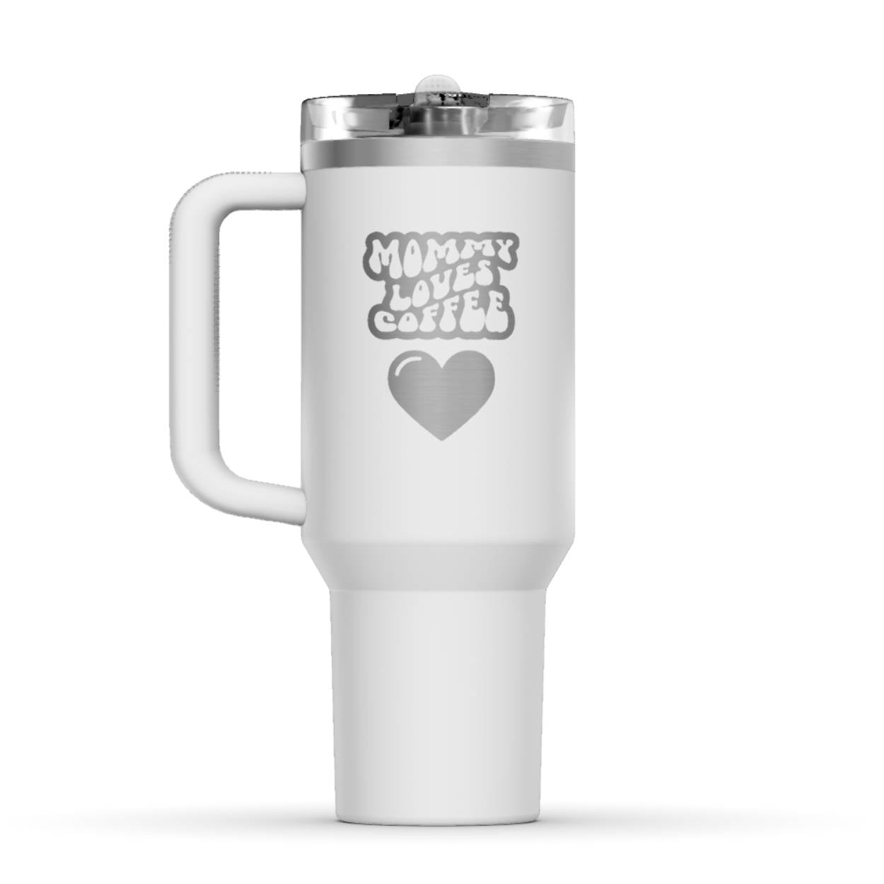 Stanley 40oz Tumbler, with a personalized twist. The perfect gift for mom. The Color of the cup is frost, a shade of light grey. It’s engraved with a typically 70s retro-style font, saying Mommy Loves Coffee. Under that text there is a nice big heart in the same style.