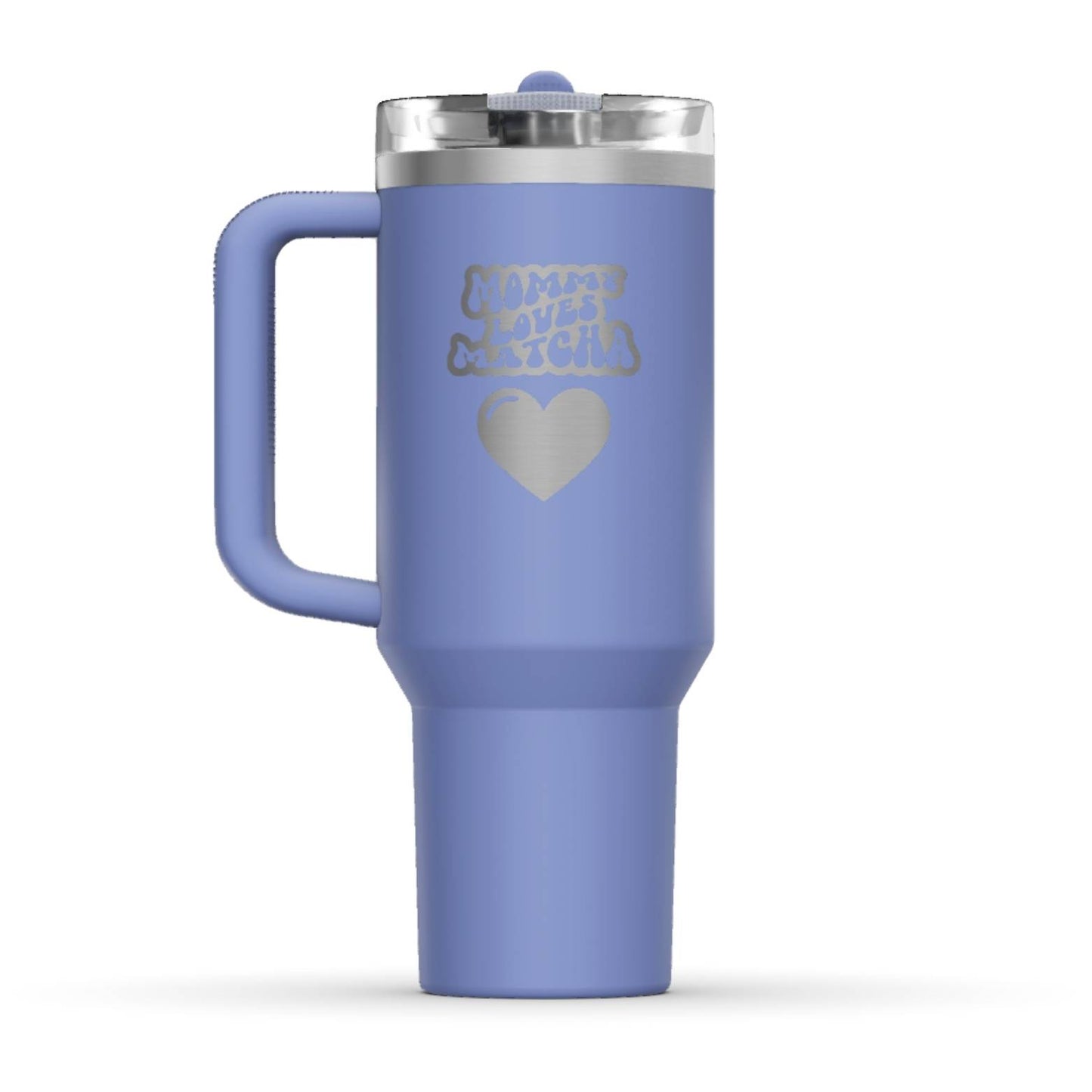 The back side of the newest Stanley 40oz Tumbler. The perfect gift for mother’s day. The Color of the cup is Hydrangea, a shade of cyan blue. It’s engraved with a typically 70s retro-style font, saying Mommy Loves Matcha. Under that text there is a nice big heart in the same retro style.