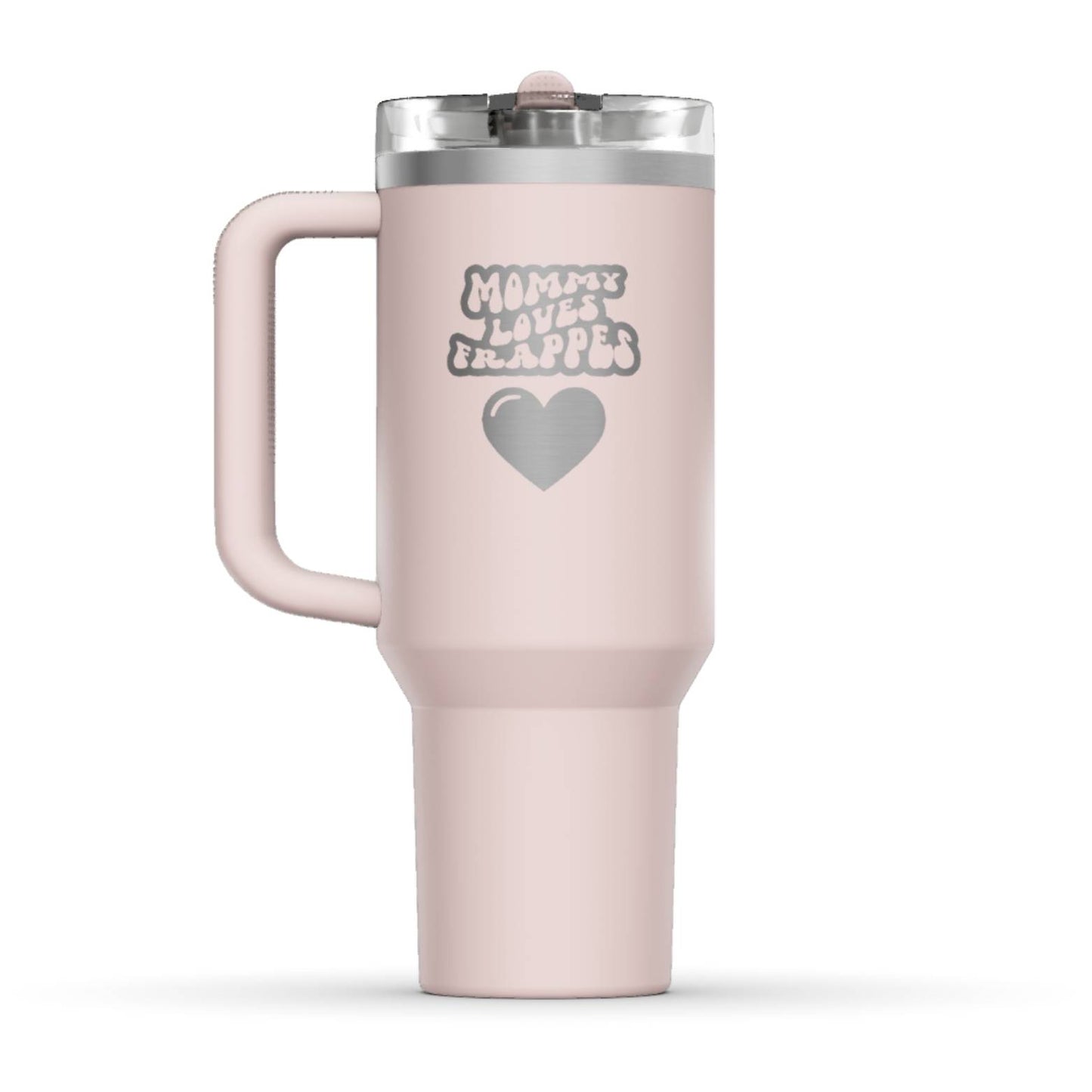 The back side of the newest Stanley 40oz Tumbler. The perfect gift for mom. The Color of the cup is Rose Quartz, a shade of soft pink. It’s engraved with a typically 70s retro-style font, saying Mommy Loves Frappes. Under that text there is a nice big heart in the same retro style.