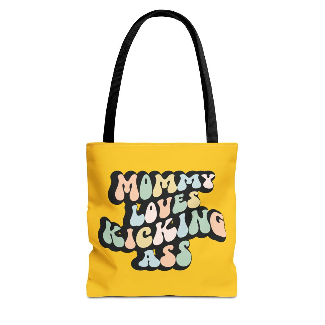 Perfect gift for mom. A mustard yellow tote bag, available in three sizes. In a typically 70s retro-style font, it says Mommy Loves Kicking Ass.