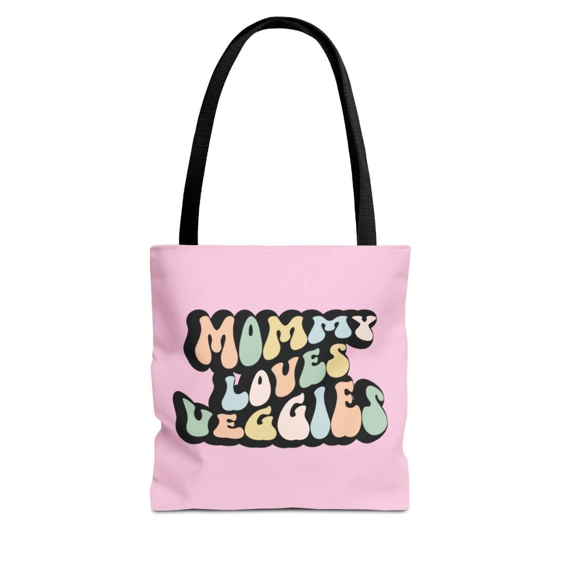 Perfect gift for mom. A pink tote bag, available in three sizes. In a typically 70s retro-style font, it says Mommy Loves Veggies. The handle is black.