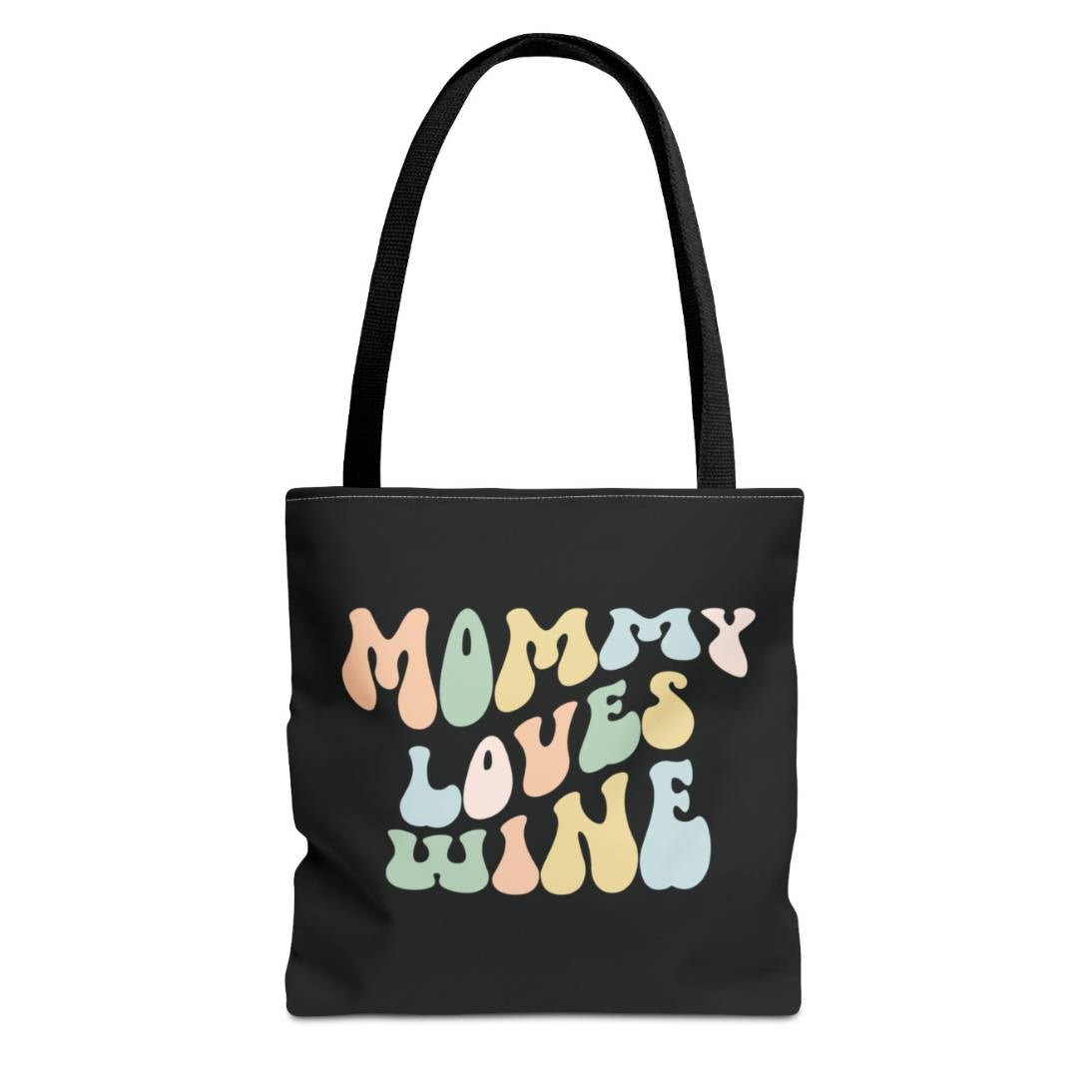 Perfect gift for mom. A black tote bag, available in three sizes. In a typically 70s retro-style font, it says Mommy Loves Wine. The handle is black.