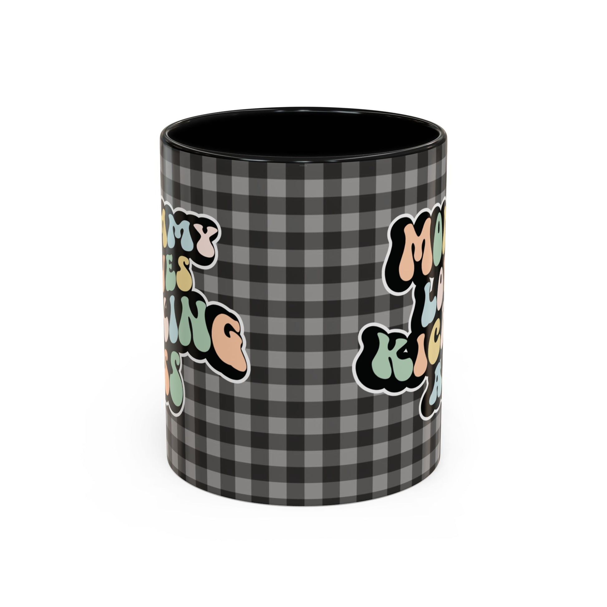 Perfect gift for mom. A decorative, 11oz ceramic mug. It’s wrapped in a black-white checkered background. In a happy and colorful 70s retro-style font it says Mommy Loves Kicking Ass on both sides. 