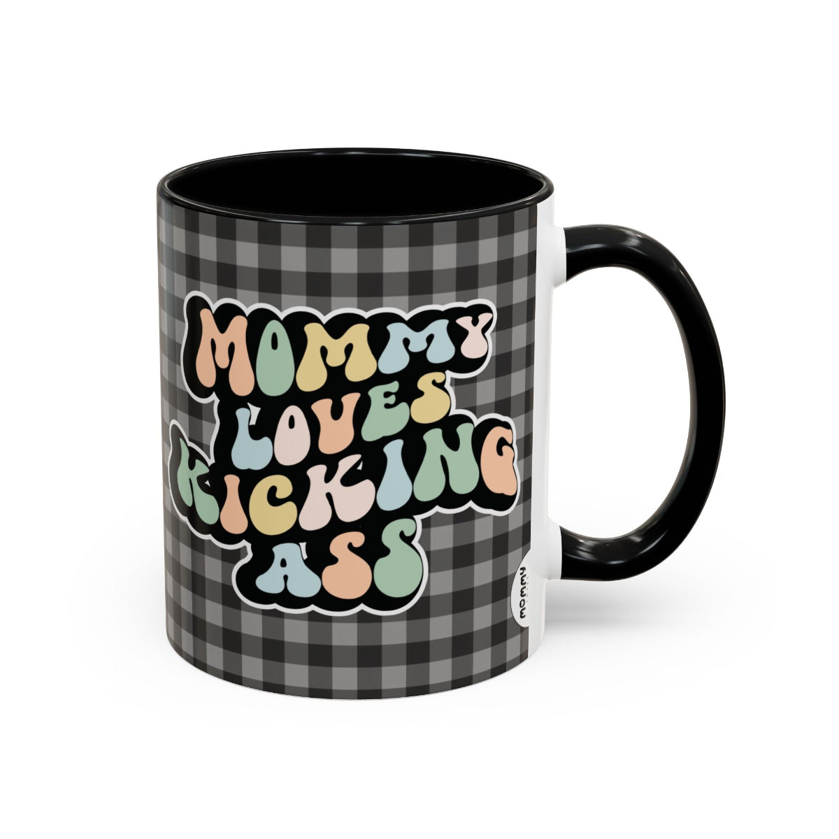 Perfect gift for mom. A decorative, 11oz ceramic mug. It’s wrapped in a black-white checkered background. In a happy and colorful 70s retro-style font it says Mommy Loves Kicking Ass on both sides. 