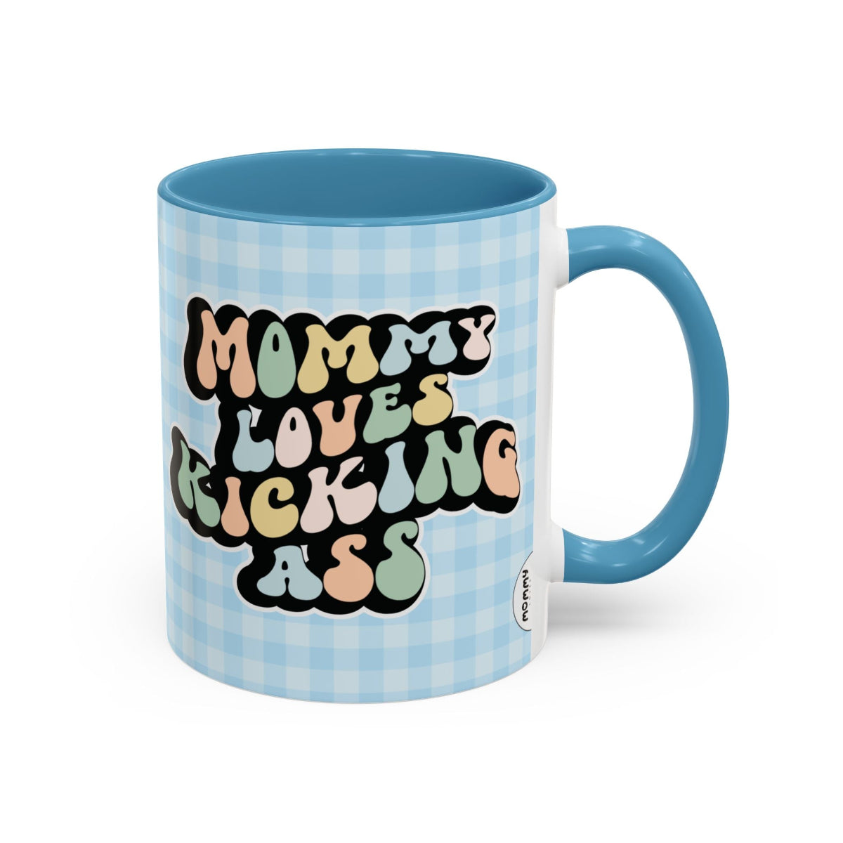 Perfect gift for mom. A decorative, 11oz ceramic mug. It’s wrapped in a light blue-white checkered background. In a happy and colorful 70s retro-style font it says Mommy Loves Kicking Ass on both sides. 