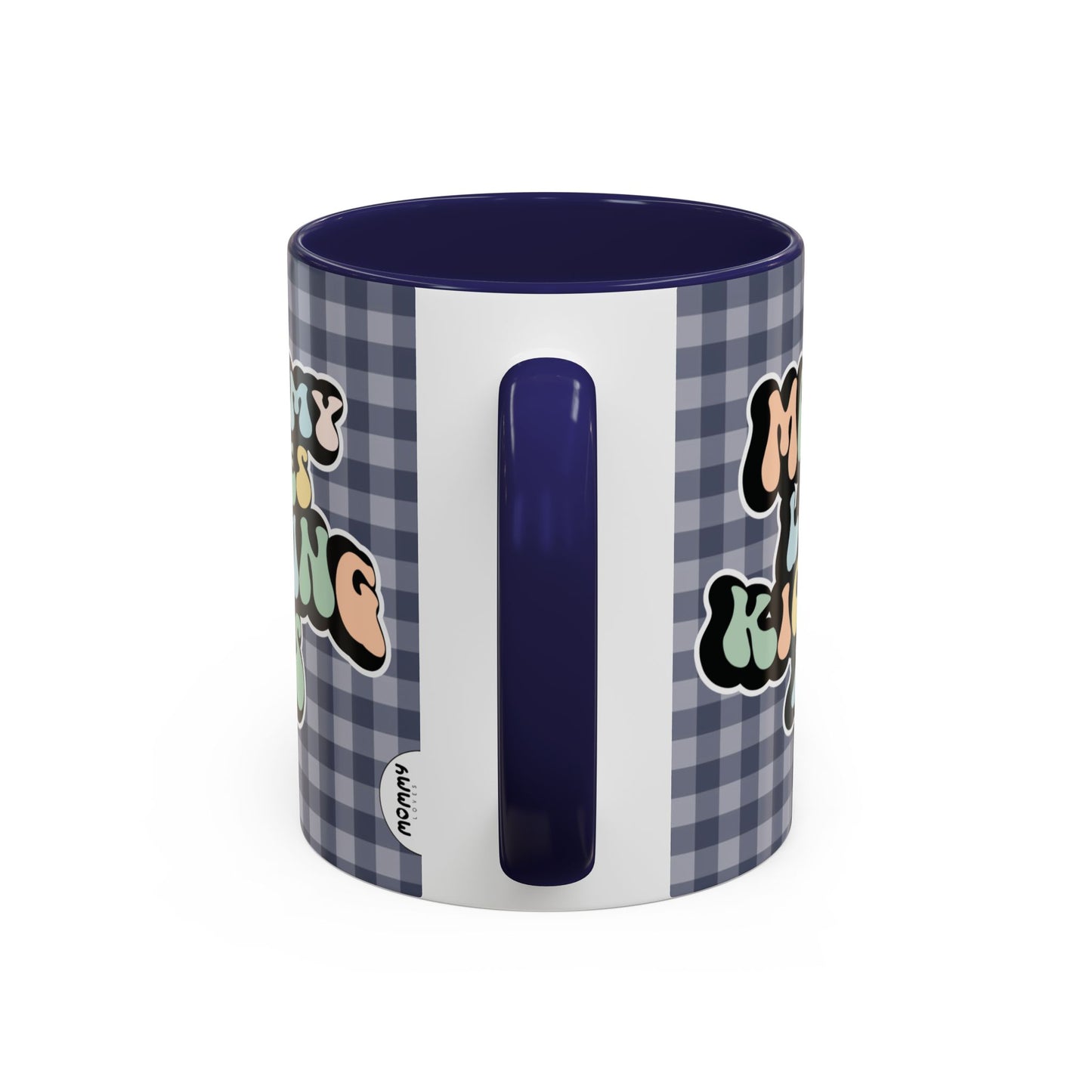 Perfect gift for mom. A decorative, 11oz ceramic mug. It’s wrapped in a navy blue-white checkered background. In a happy and colorful 70s retro-style font it says Mommy Loves Kicking Ass on both sides. 