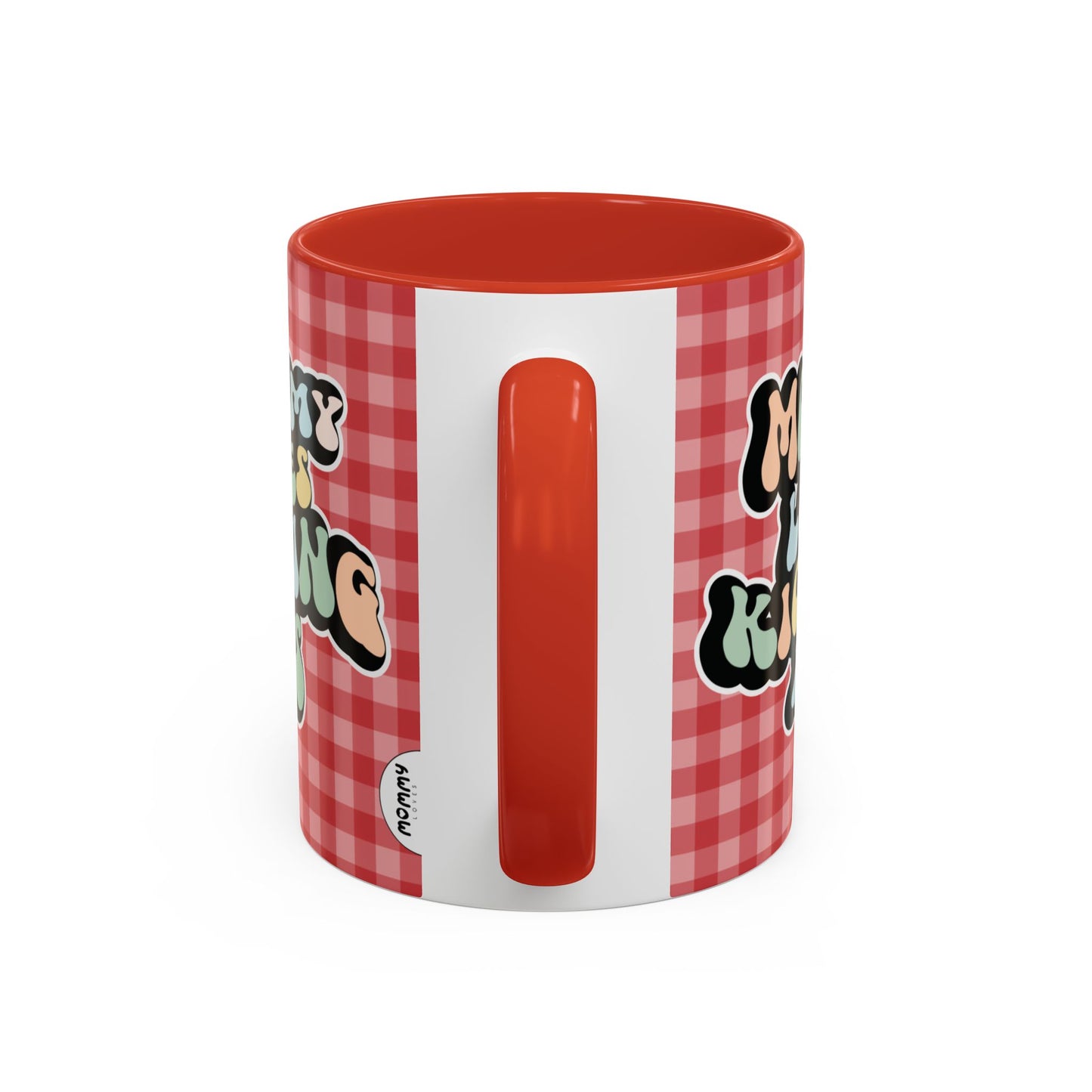 Perfect gift for mom. A decorative, 11oz ceramic mug. It’s wrapped in a red-white checkered background. In a happy and colorful 70s retro-style font it says Mommy Loves Kicking Ass on both sides. 