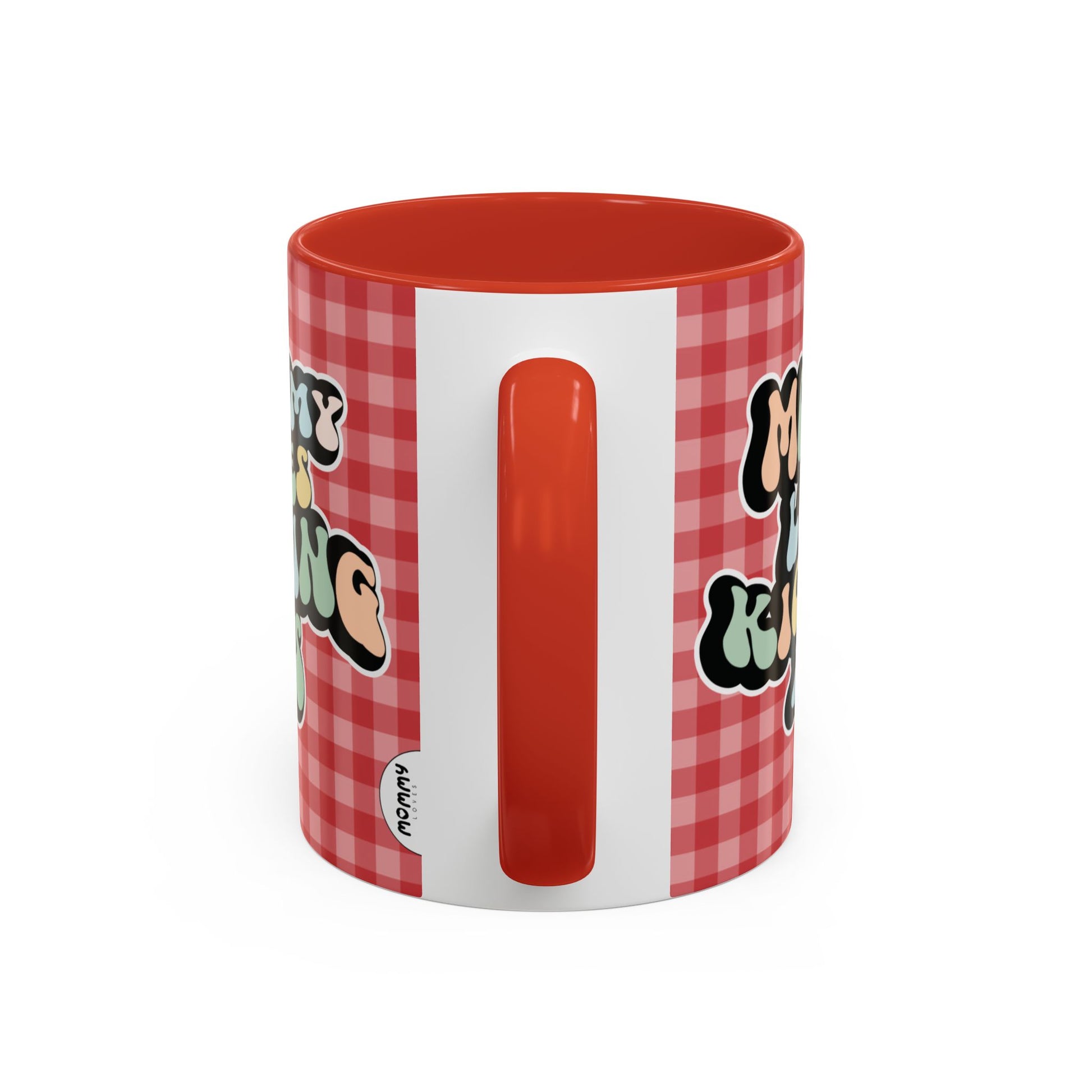 Perfect gift for mom. A decorative, 11oz ceramic mug. It’s wrapped in a red-white checkered background. In a happy and colorful 70s retro-style font it says Mommy Loves Kicking Ass on both sides. 