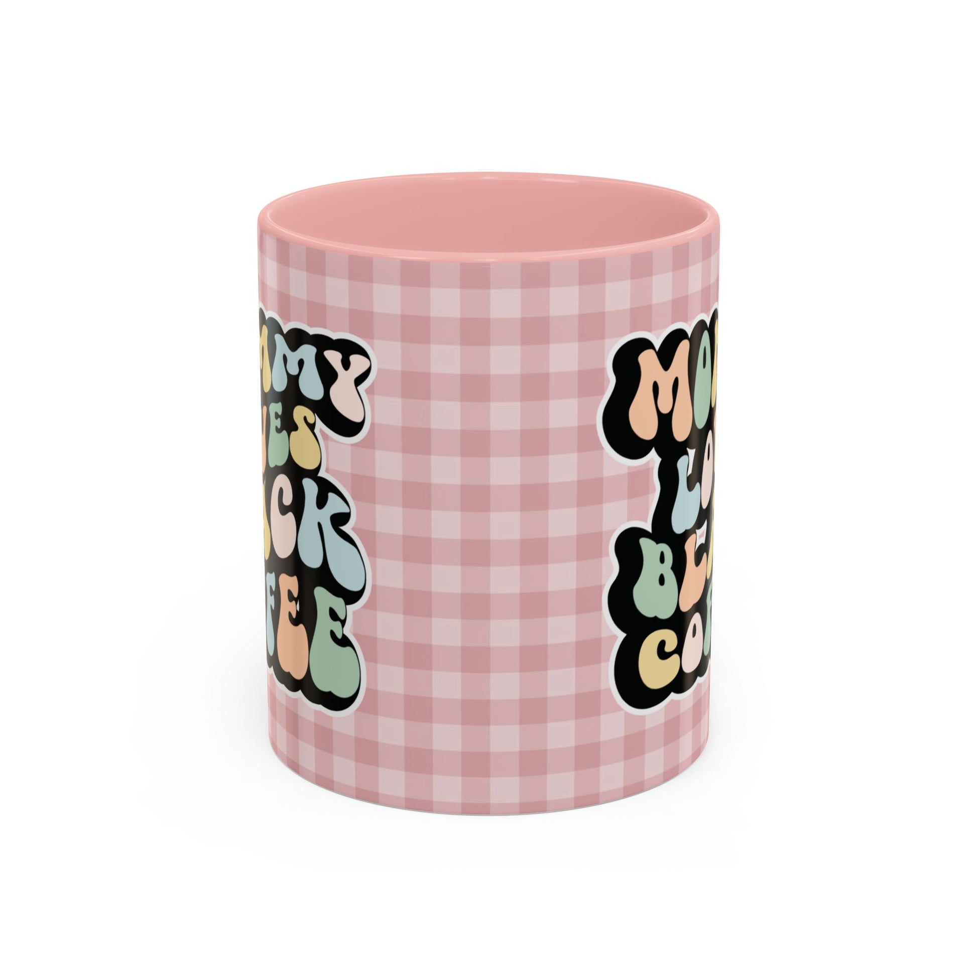 Perfect gift for mom. A decorative, 11oz ceramic mug. It’s wrapped in a soft pink-white checkered background. In a happy and colorful 70s retro-style font it says Mommy Loves Black Coffee on both sides. 