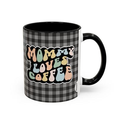 Perfect gift for mom. A decorative, 11oz ceramic mug. It’s wrapped in a black-white checkered background. In a happy and colorful 70s retro-style font it says Mommy Loves Coffee, on both sides. 