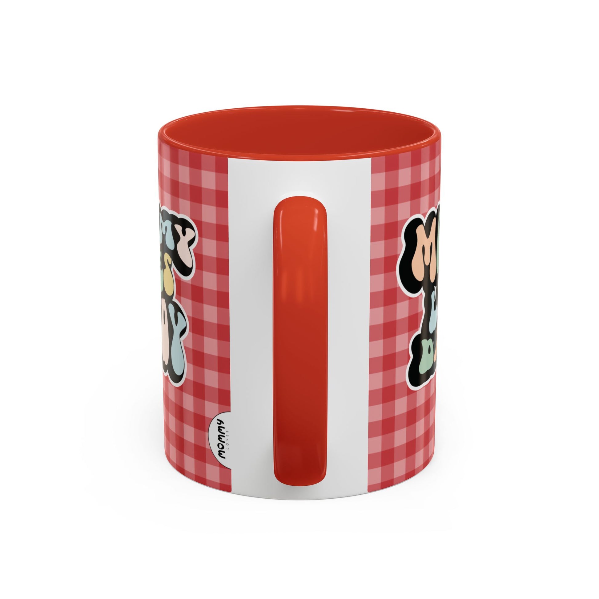 Perfect gift for mom. A decorative, 11oz ceramic mug. It’s wrapped in a red-white checkered background. In a happy and colorful 70s retro-style font it says Mommy Loves Daddy, on both sides. 