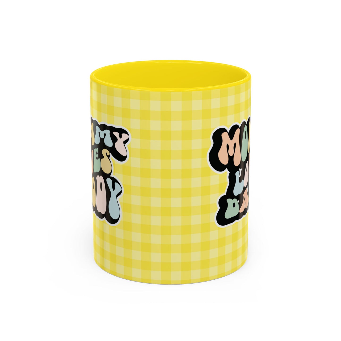 Perfect gift for mom. A decorative, 11oz ceramic mug. It’s wrapped in a yellow-white checkered background. In a happy and colorful 70s retro-style font it says Mommy Loves Daddy, on both sides. 