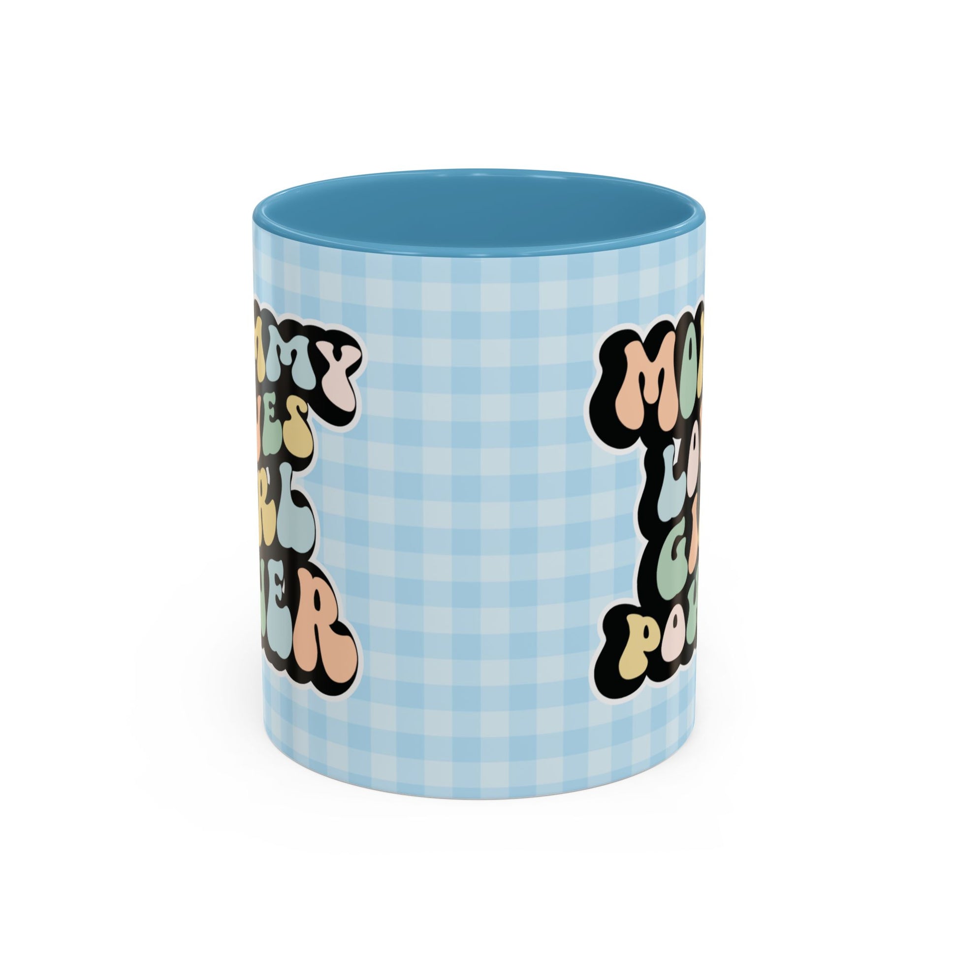 Perfect gift for mom. A decorative, 11oz ceramic mug. It’s wrapped in a light blue-white checkered background. In a happy and colorful 70s retro-style font it says Mommy Loves Girl Power, on both sides. 