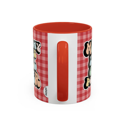 Perfect gift for mom. A decorative, 11oz ceramic mug. It’s wrapped in a red-white checkered background. In a happy and colorful 70s retro-style font it says Mommy Loves Girl Power, on both sides. 