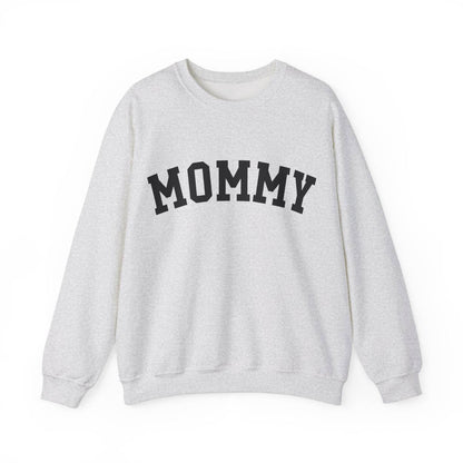 The perfect gift for mom. Our Mother’s Day special. Our crewneck sweatshirt. The color of the shirt is ash, and in big black varsity letters it says MOMMY on the chest. It’s available in six sizes, ranging from S to 3XL. 
