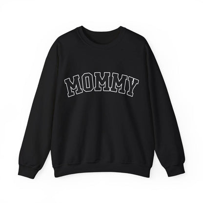 The perfect gift for mom. Our Mother’s Day special. Our crewneck sweatshirt. The color of the shirt is black, and in big varsity letters it says MOMMY on the chest. It’s available in six sizes, ranging from S to 3XL. 