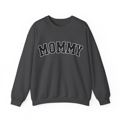 The perfect gift for mom. Our Mother’s Day special. Our crewneck sweatshirt. The color of the shirt is dark heather, and in big varsity letters it says MOMMY on the chest. It’s available in six sizes, ranging from S to 3XL. 