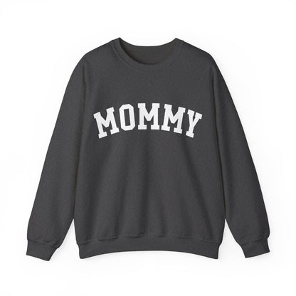 The perfect gift for mom. Our Mother’s Day special. Our crewneck sweatshirt. The color of the shirt is dark heather, and in big white varsity letters it says MOMMY on the chest. It’s available in six sizes, ranging from S to 3XL. 