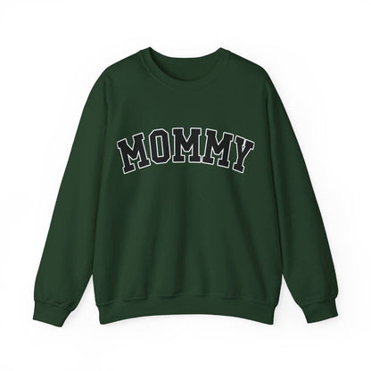 The perfect gift for mom. Our Mother’s Day special. Our crewneck sweatshirt. The color of the shirt is forest green, and in big varsity letters it says MOMMY on the chest. It’s available in six sizes, ranging from S to 3XL. 